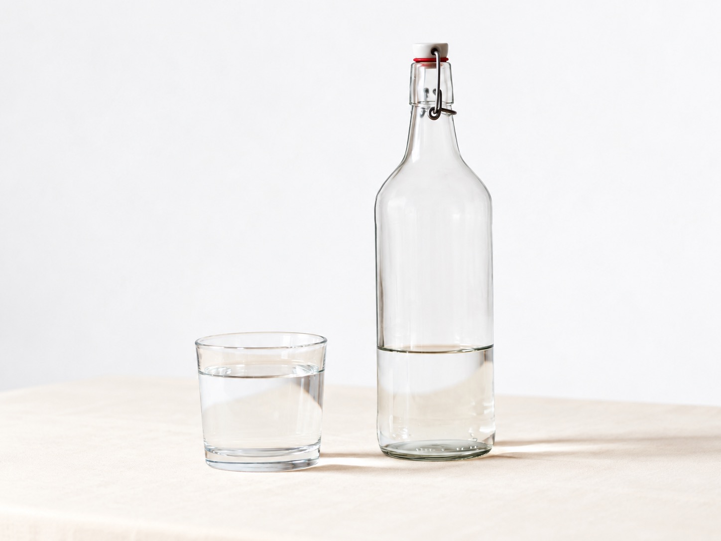 Glass bottle with a hinged swing-top closure showing a different closure construction