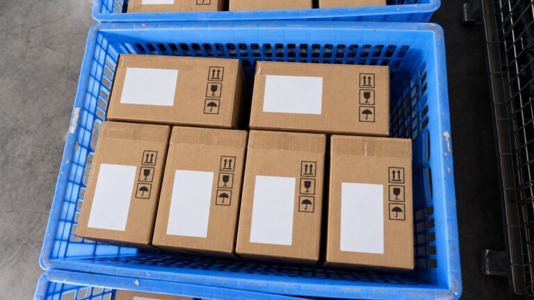 Carton markings on export cartons with handling symbols and blank shipping labels