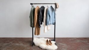 Five garments on a rack illustrating product mix when comparing supplier defect rates