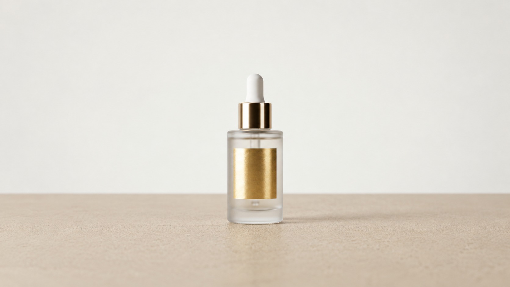 Complete dropper bottle with a gold label distinct from its outer shipping package