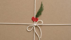Neutral packaging illustrated by a brown paper parcel with a marked wax seal