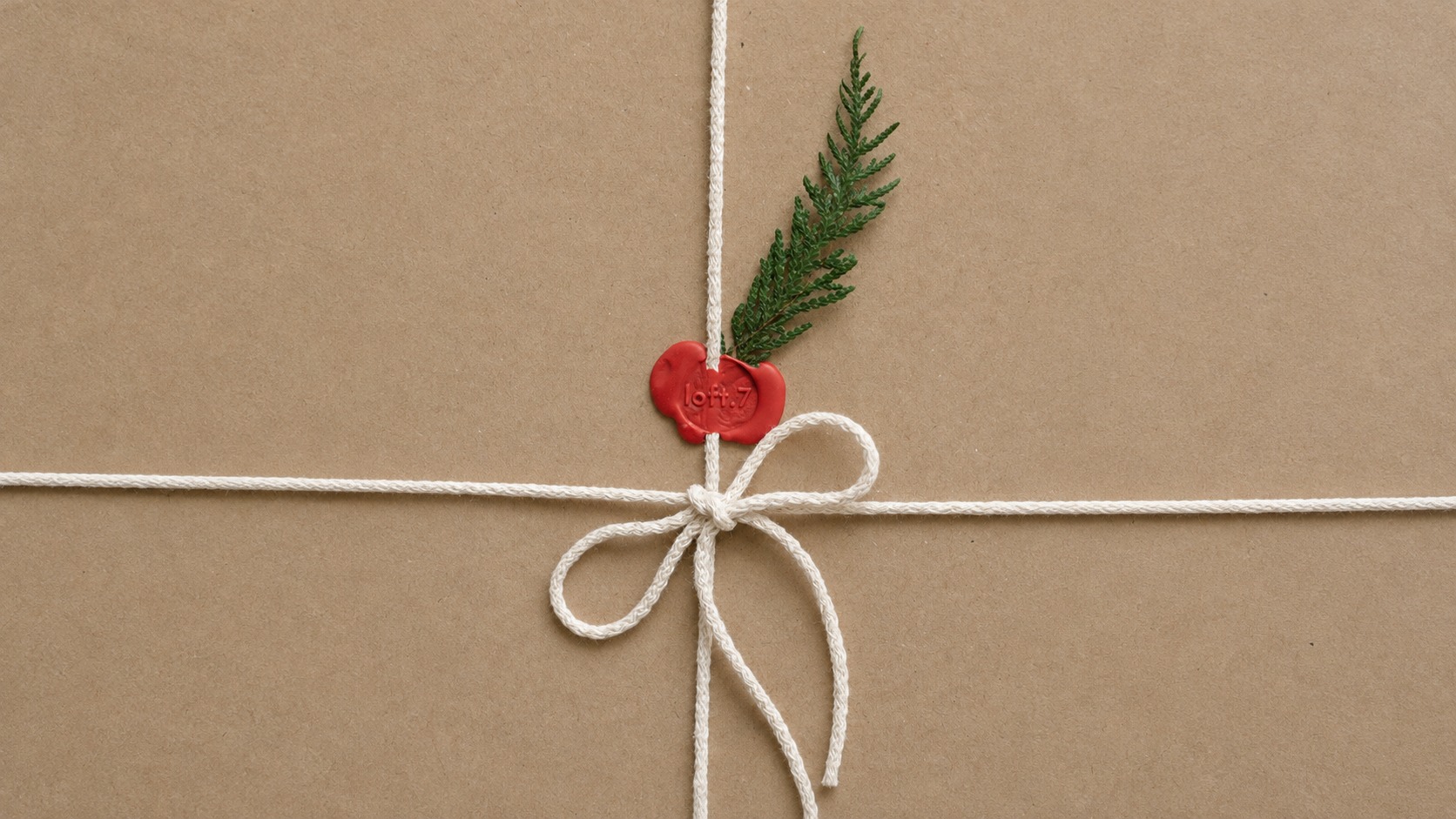 Neutral packaging illustrated by a brown paper parcel with a marked wax seal