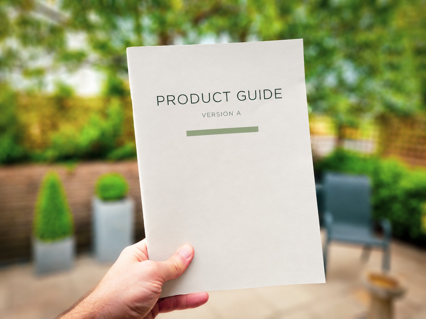 Hand holding a paper product guide marked Version A