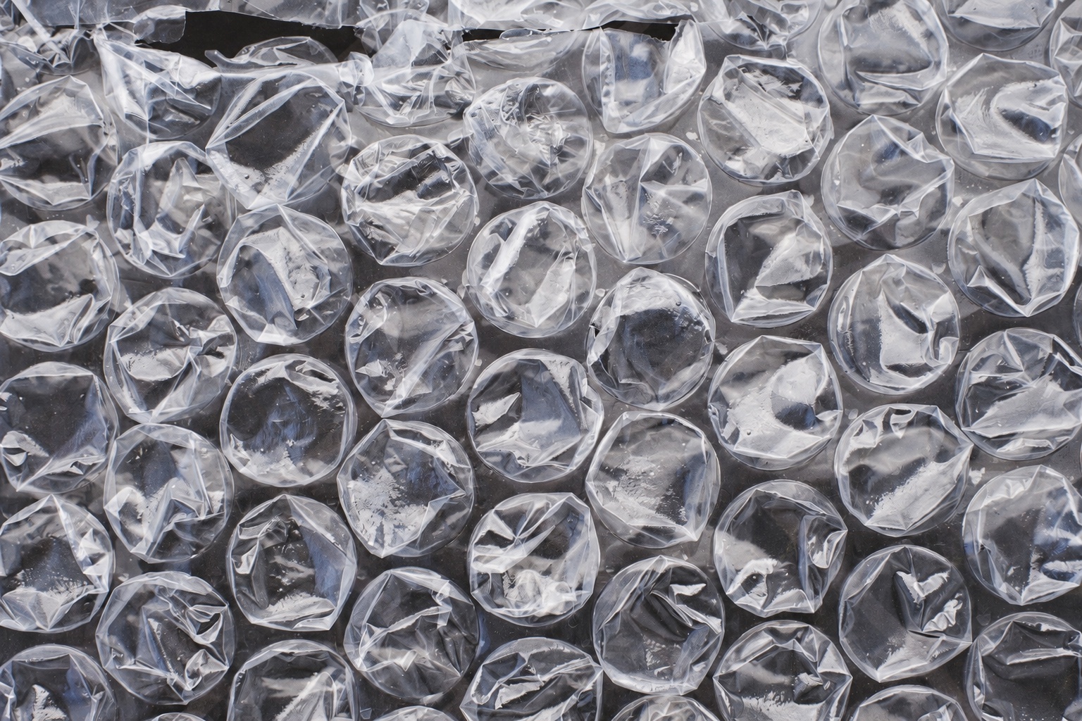 Close-up of clear cushioning film with visible air pockets and folds