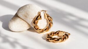 Gold-colored hoop earrings showing the visible finish discussed for gold plated jewelry
