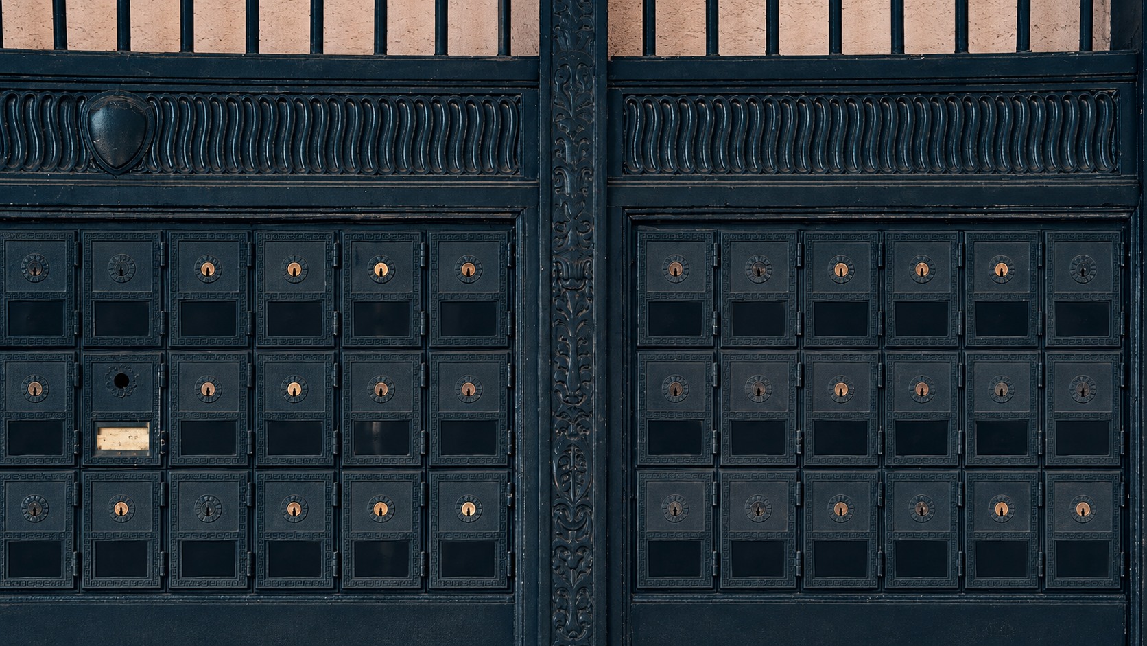 Separate mailbox compartments with identifying labels removed