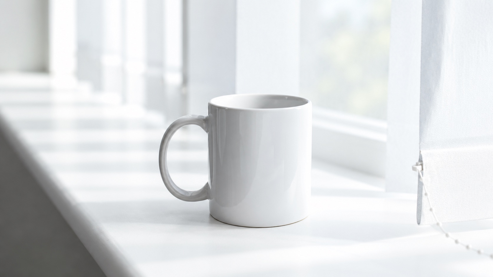 White ceramic mug with a projecting handle and visible rim, illustrating ceramic mug packaging considerations