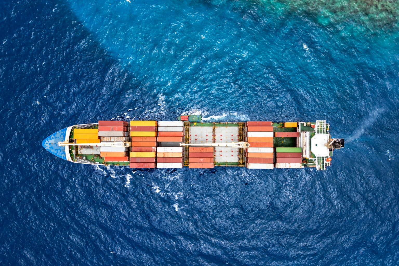 Top-down view of a container ship at sea illustrating transport after China warehouse receipt
