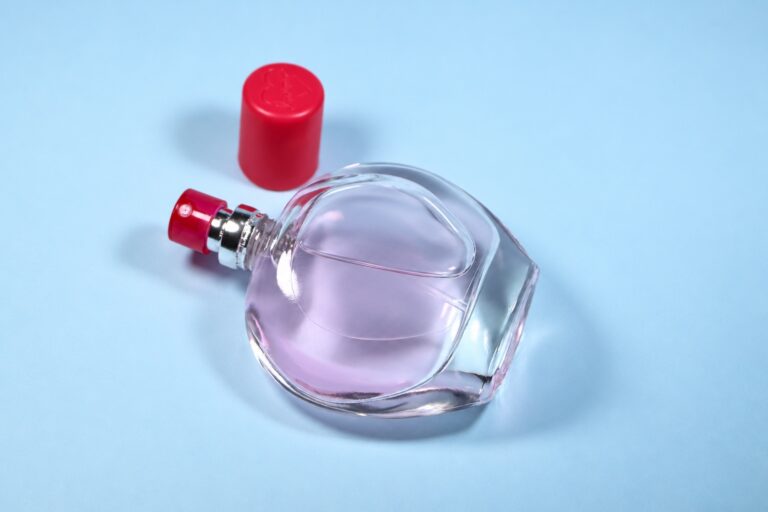 Glass bottle and detached cap illustrating visual content needs before sample shipping