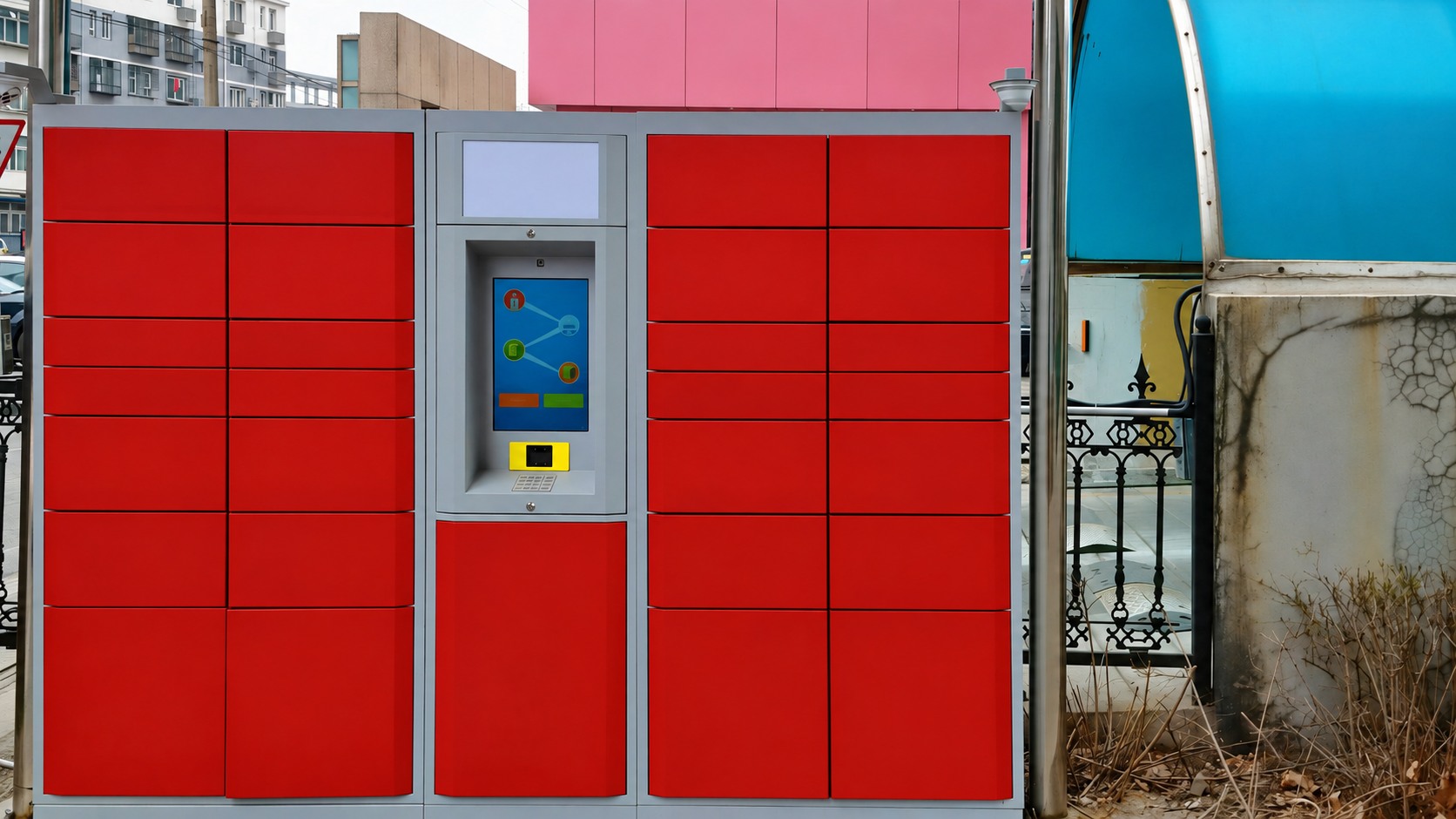 Red parcel lockers with a central screen and scanner